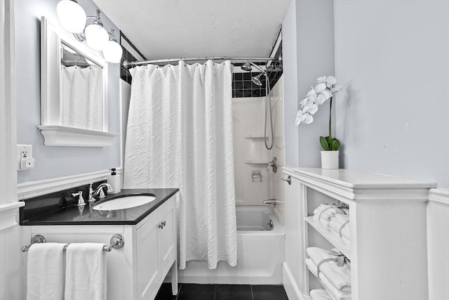 109 Bouve Ave, Brockton, MA 02301 - bathroom with shower / tub combo with curtain, vanity, and tile patterned floors