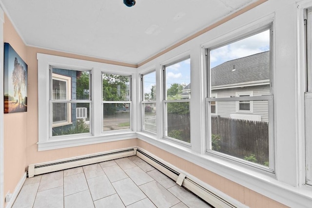 109 Bouve Ave, Brockton, MA 02301 - unfurnished sunroom featuring plenty of natural light, baseboards, tile patterned flooring, a baseboard heating unit, and ornamental molding