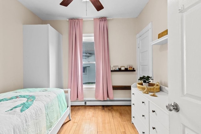 109 Bouve Ave, Brockton, MA 02301 - bedroom with baseboard heating, light wood-style flooring, ceiling fan, and multiple windows