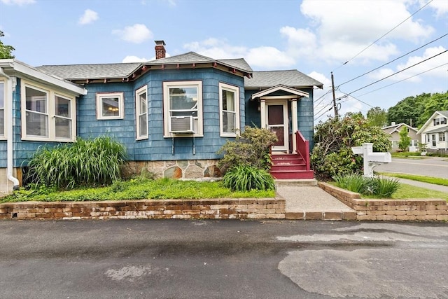 109 Bouve Ave, Brockton, MA 02301 - view of front of property with a chimney, a shingled roof, and cooling unit