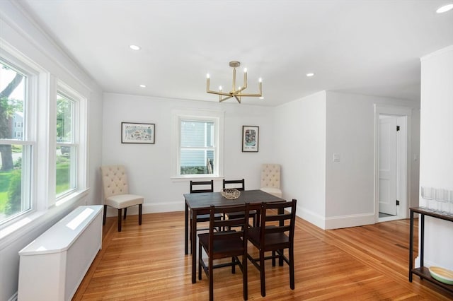 8 Carisbrooke St, Andover, MA 01810 - dining room featuring radiator, light wood finished floors, a chandelier, and recessed lighting