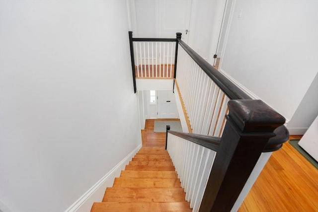 8 Carisbrooke St, Andover, MA 01810 - staircase featuring wood finished floors