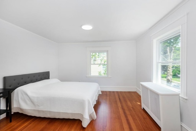 8 Carisbrooke St, Andover, MA 01810 - bedroom featuring wood finished floors and ornamental molding