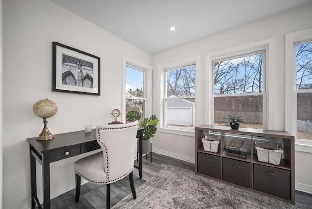 home office featuring recessed lighting, baseboards, plenty of natural light, and wood finished floors