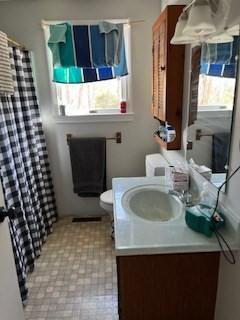 17 Ebenezer Rd, Barnstable, MA 02655 - full bath with vanity, curtained shower, and toilet