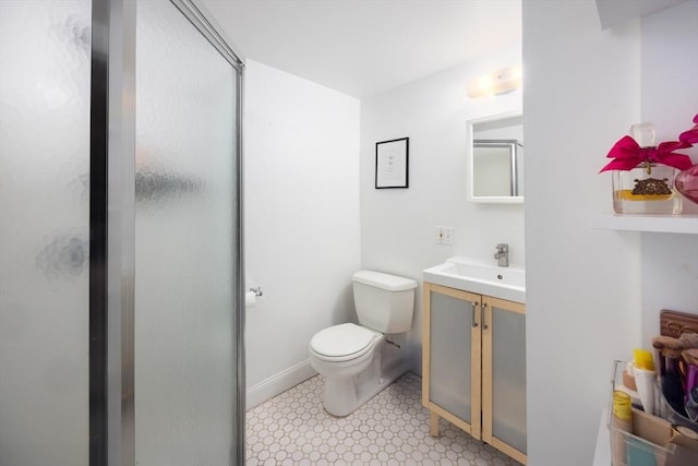 bathroom featuring walk in shower, vanity, and toilet