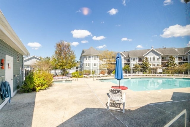 501 Commerce Dr Unit 1304, Braintree, MA 02184 - community pool with a residential view and a patio area