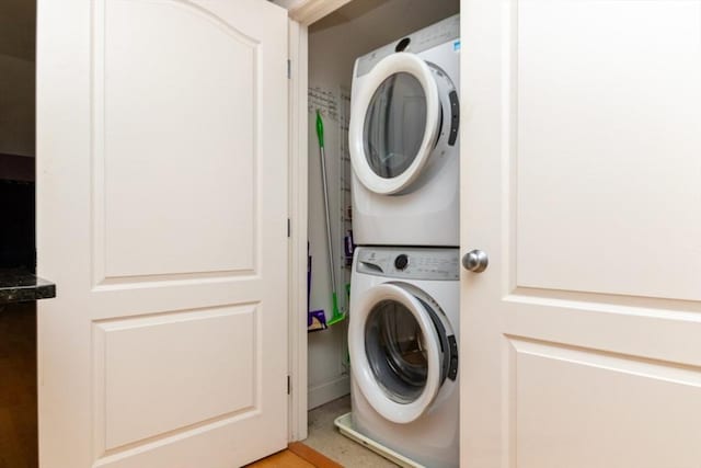 501 Commerce Dr Unit 1304, Braintree, MA 02184 - washroom with stacked washer and clothes dryer