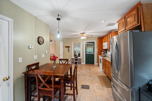 235 Union St, Northbridge, MA 01588 - dining space with a ceiling fan and light tile patterned floors