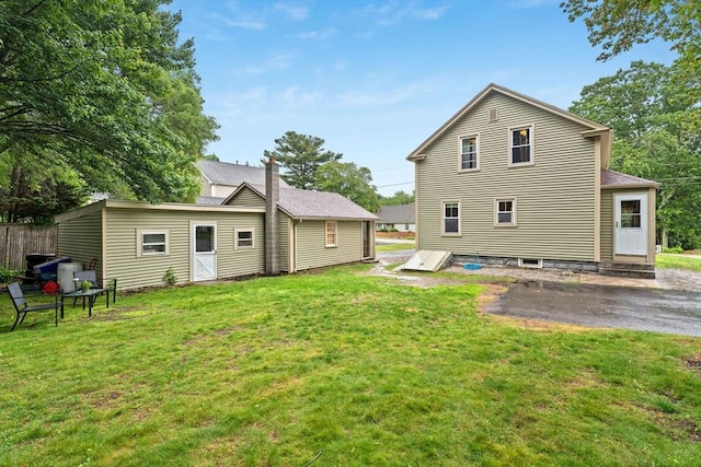 235 Union St, Northbridge, MA 01588 - back of property with a yard and entry steps