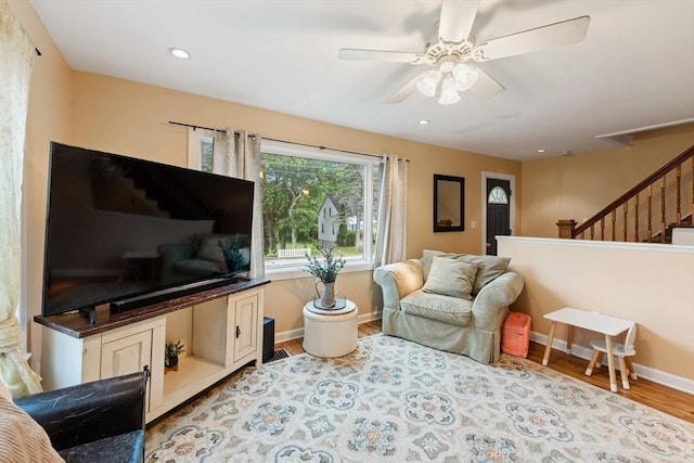 235 Union St, Northbridge, MA 01588 - living area with stairway, light wood finished floors, a ceiling fan, and recessed lighting