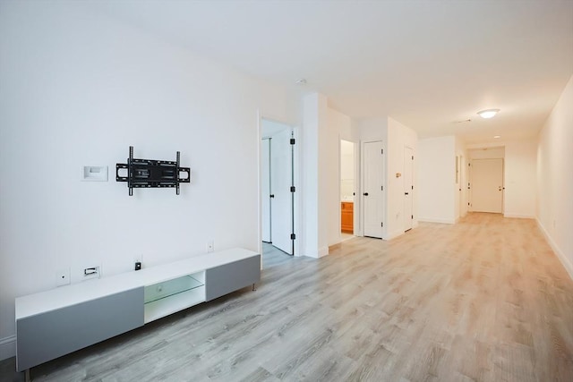 corridor featuring light hardwood / wood-style flooring