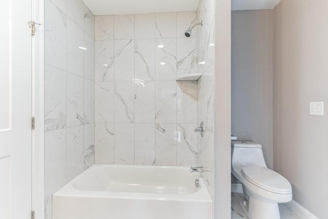 full bath with baseboards, toilet, marble finish floor, and  shower combination