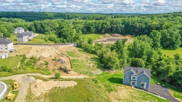 aerial view with a wooded view