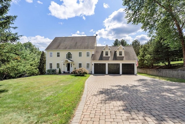 63 High St, Shrewsbury, MA 01545 - colonial inspired home with an attached garage, a front yard, and decorative driveway