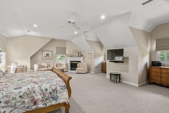 63 High St, Shrewsbury, MA 01545 - bedroom with lofted ceiling, carpet floors, baseboards, and visible vents