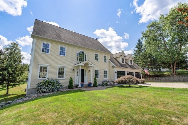 63 High St, Shrewsbury, MA 01545 - colonial-style house with a front lawn and roof with shingles