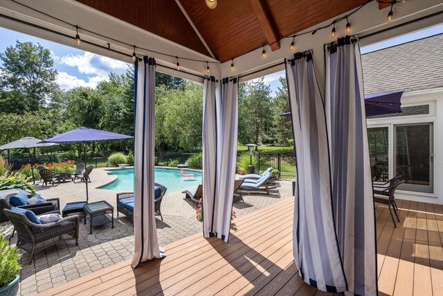 63 High St, Shrewsbury, MA 01545 - deck with fence, a fenced in pool, and a patio