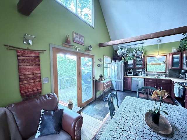 26 Horseshoe Cir, Ware, MA 01082 - kitchen featuring electric range oven, freestanding refrigerator, plenty of natural light, dishwasher, and a towering ceiling