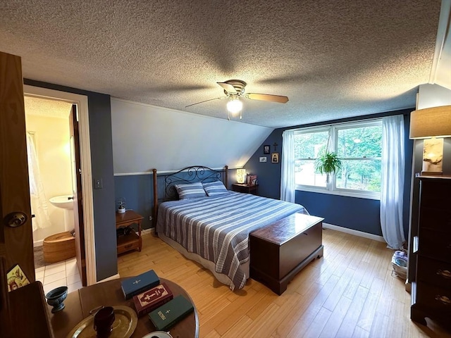 26 Horseshoe Cir, Ware, MA 01082 - bedroom with baseboards, light wood-style flooring, a textured ceiling, ceiling fan, and vaulted ceiling