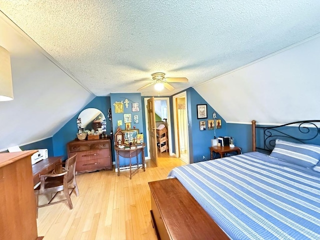 26 Horseshoe Cir, Ware, MA 01082 - bedroom with light wood-style flooring, a textured ceiling, lofted ceiling, and a ceiling fan