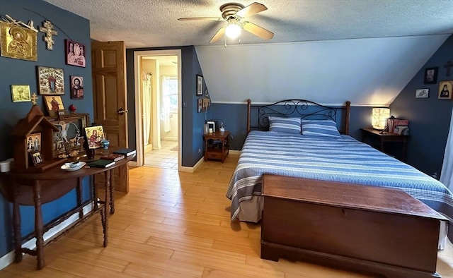 26 Horseshoe Cir, Ware, MA 01082 - bedroom with a textured ceiling, light wood-type flooring, baseboards, ceiling fan, and vaulted ceiling