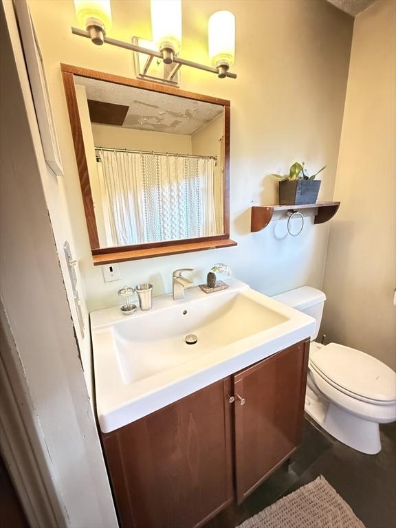 26 Horseshoe Cir, Ware, MA 01082 - bathroom with vanity and toilet