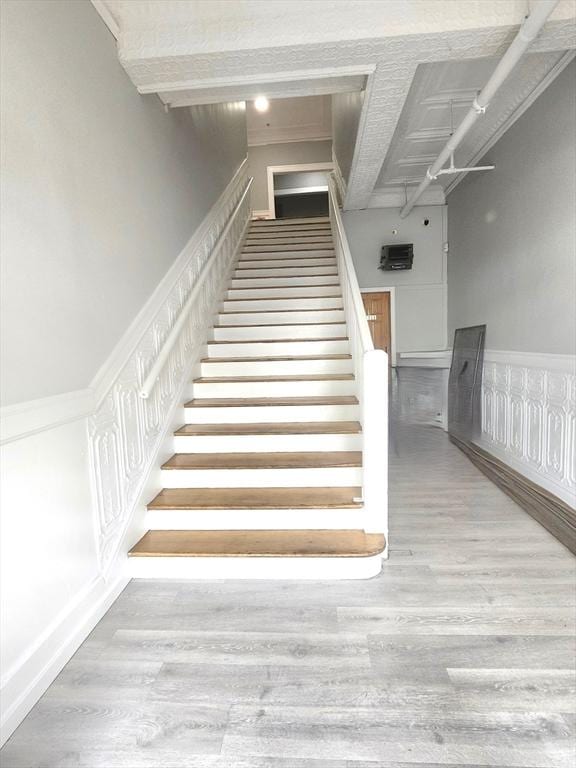 202 Broadway Unit 2-1, Lawrence, MA 01840 - staircase featuring wood finished floors