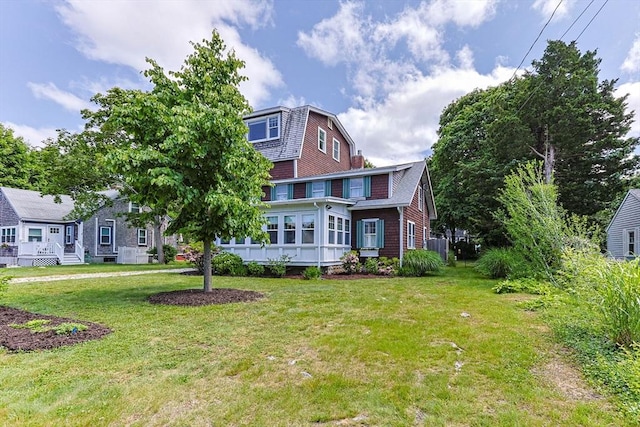 34 Kenwood Rd, Bourne, MA 02559 - back of house with a lawn