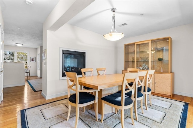 dining room featuring light wood-type flooring