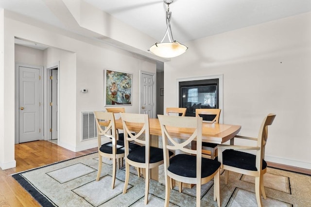 dining space featuring light hardwood / wood-style floors