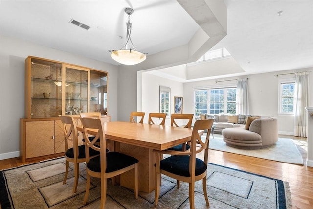 dining room with light wood-type flooring