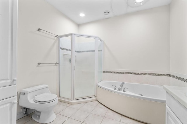 full bathroom with toilet, tile patterned flooring, shower with separate bathtub, and vanity