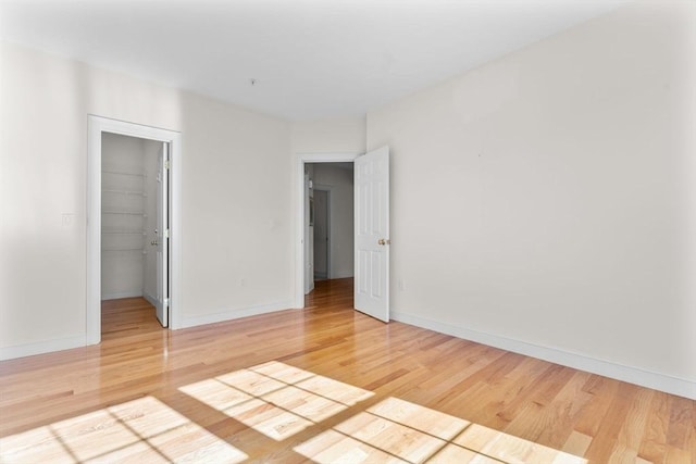 unfurnished room featuring hardwood / wood-style floors