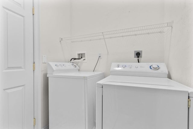 laundry room with washer and dryer