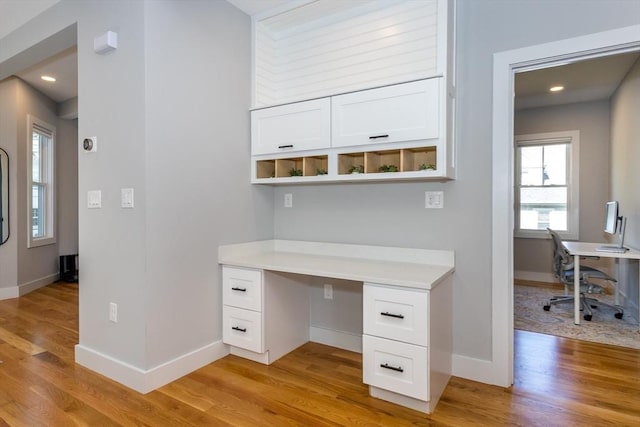 61 Paul Revere Rd Unit 2, Arlington, MA 02476 - unfurnished office with baseboards and light wood-style floors
