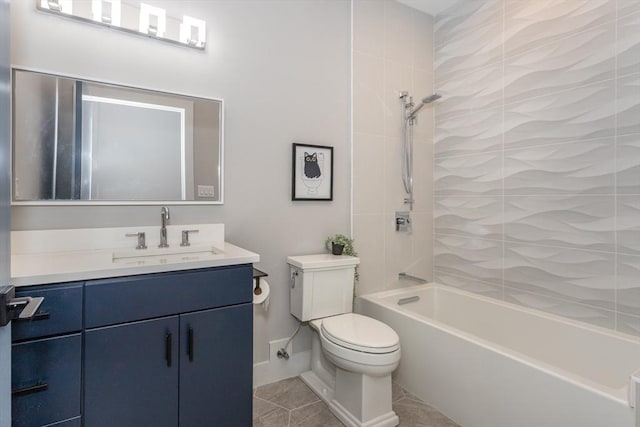 61 Paul Revere Rd Unit 2, Arlington, MA 02476 - bathroom with toilet, baseboards, shower / tub combination, tile patterned floors, and vanity