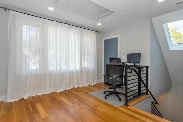 61 Paul Revere Rd Unit 2, Arlington, MA 02476 - office space with recessed lighting, attic access, baseboards, visible vents, and wood finished floors