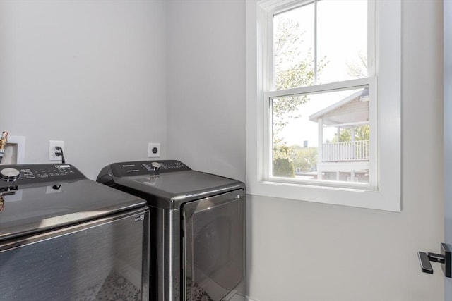 61 Paul Revere Rd Unit 2, Arlington, MA 02476 - clothes washing area with separate washer and dryer, laundry area, and a healthy amount of sunlight