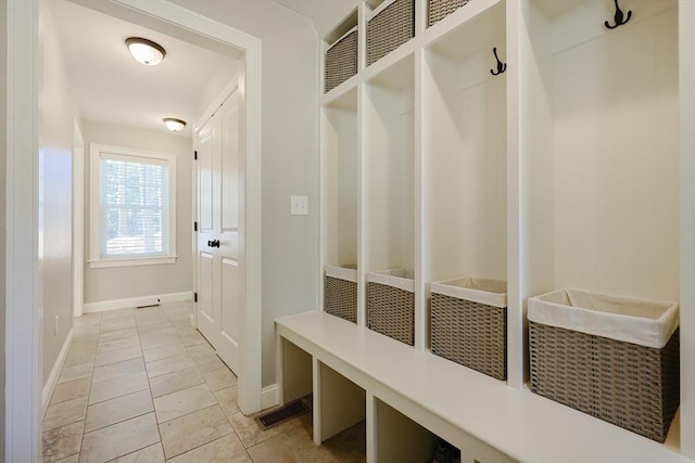 mudroom featuring light tile patterned floors