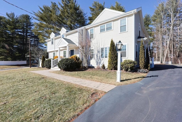 view of front property with a front lawn