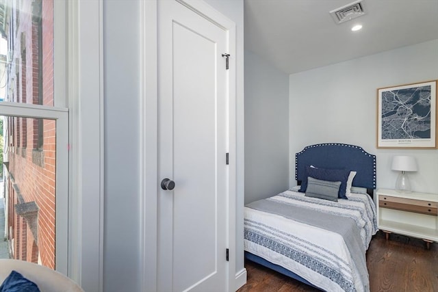 221 Paris St Unit 1, Boston, MA 02128 - bedroom with dark wood-style flooring and recessed lighting