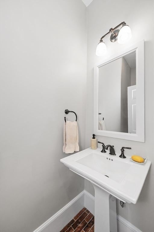 bathroom featuring baseboards