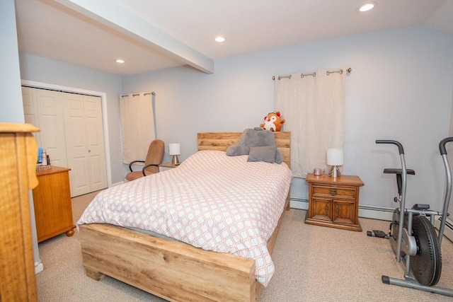 bedroom featuring recessed lighting, a closet, and light colored carpet