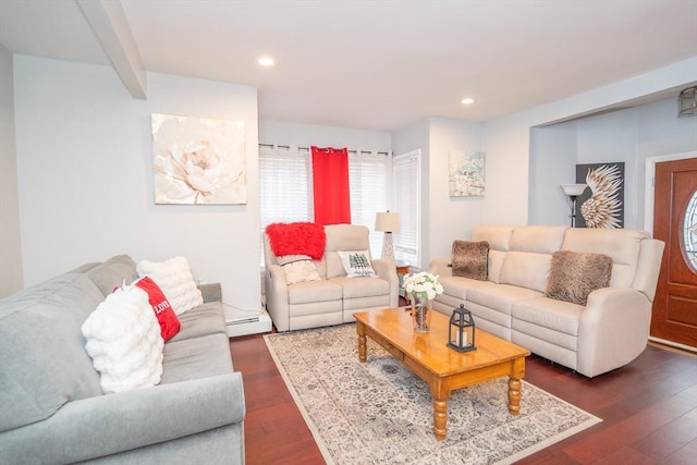 living room featuring a baseboard heating unit, beamed ceiling, dark wood-type flooring, and recessed lighting