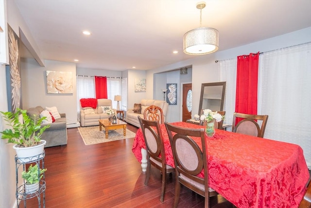 dining room with recessed lighting, dark wood-style flooring, and a baseboard radiator