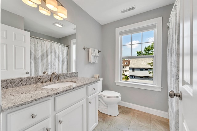 1400 Gorham Unit 3, Lowell, MA 01852 - full bathroom featuring baseboards and vanity