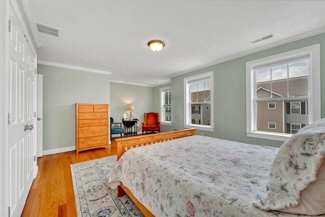1400 Gorham Unit 3, Lowell, MA 01852 - bedroom featuring ornamental molding and light wood finished floors