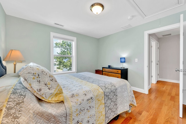 1400 Gorham Unit 3, Lowell, MA 01852 - bedroom with attic access and light wood-style floors