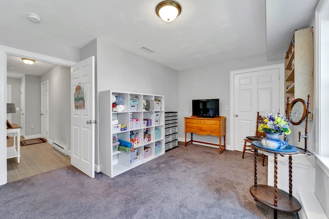 1400 Gorham Unit 3, Lowell, MA 01852 - living area with carpet and a baseboard radiator